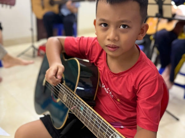 DẠY KÈM GUITAR